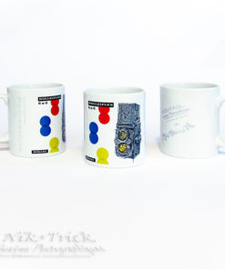 Rolleiflex Mug by Nik & Trick This one-off design derived from an exquisite pen and ink drawing of a 2.8f Rolleiflex and finalised by ourselves to create this unique and funky product. A product so good in fact...we have one ourselves at home!