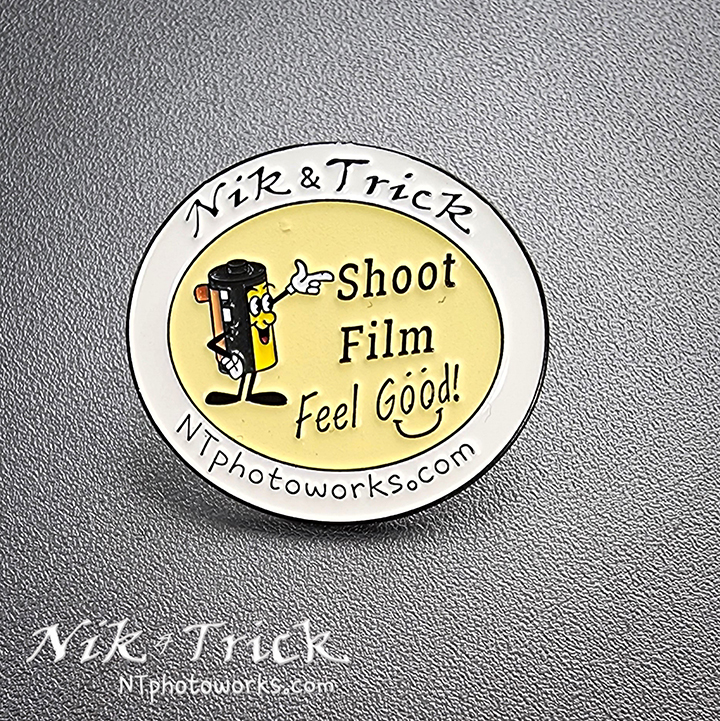 Nik & Trick Shoot Film Enamel Pin Badge